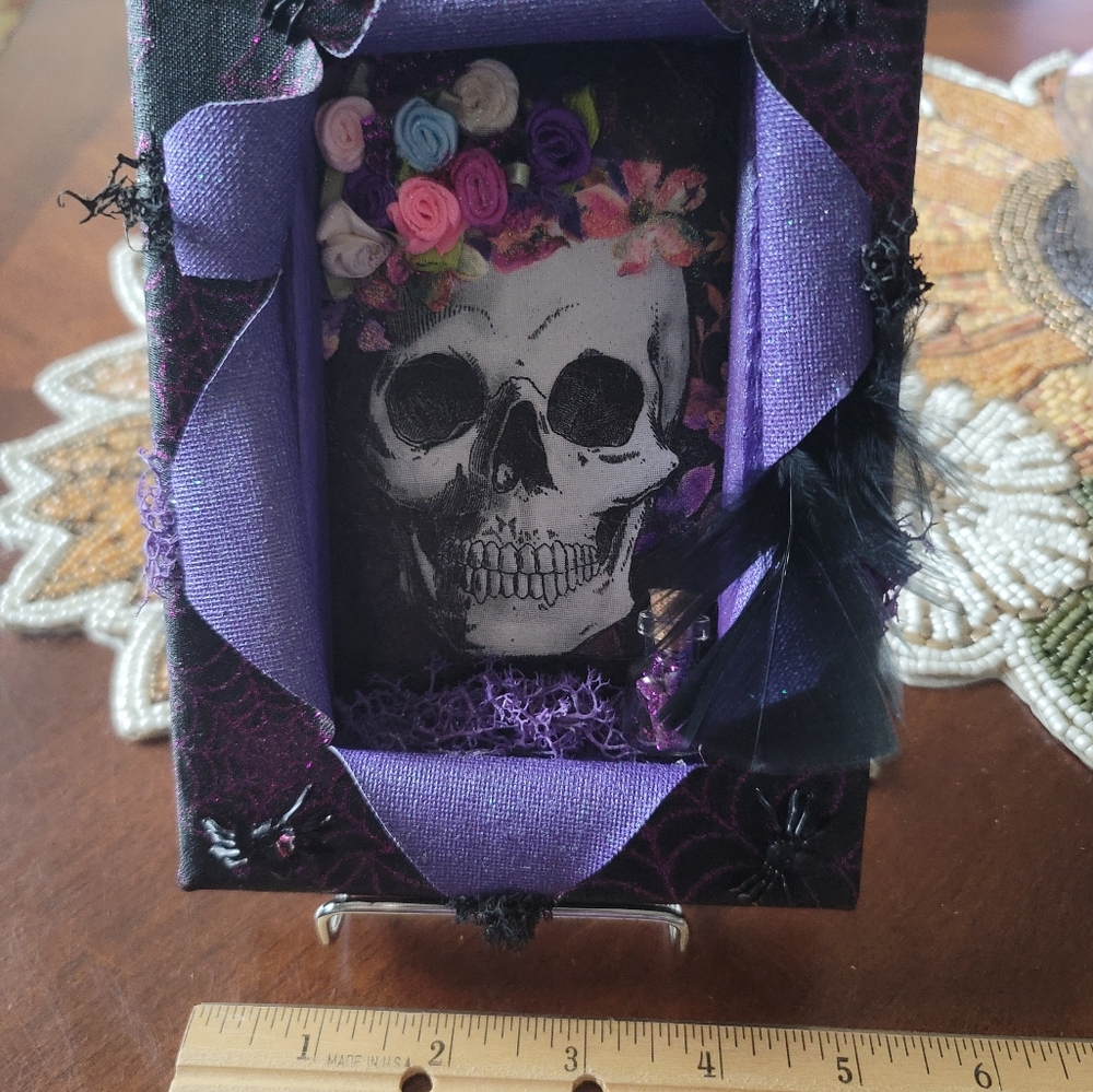 Sugar Skull 'Busted Canvas' embellished with ribbon flowers, spiders & moss.